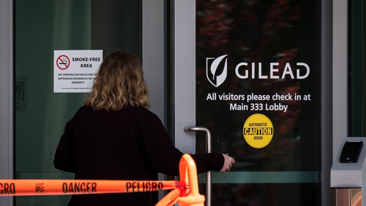 A person enters a building at Gilead headquarters in Foster City, California on March 19. Photographer: David Paul Morris/Bloomberg