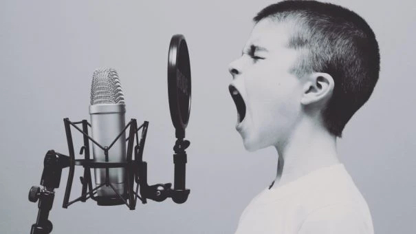 jason-rosewell-voice-microphone-child-unsplash-605x340